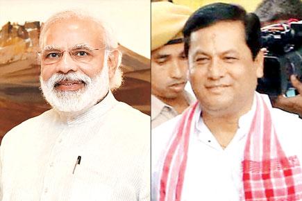 PM Modi praises Sonowal for discharging duties despite polls