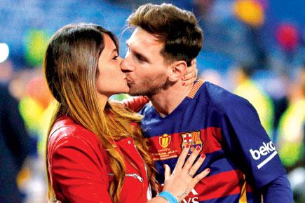 Sealing it with a kiss! Messi and partner Antonella's intimate moment