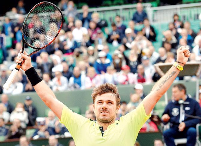 Stanislas Wawrinka reacts after winning his first round match against Lukas Rosol at the French Open in Paris yesterday. Pic/AFP