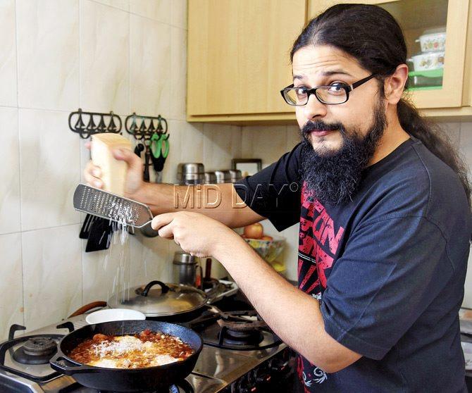 Sahil Makhija cooks a baconised version of the shakshouka.  pic/nimesh dave