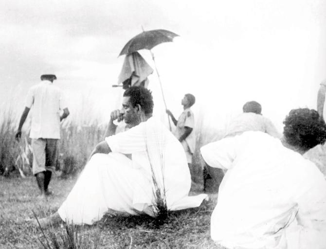 Ray waiting for the right weather during the shoot of Pather Panchali
