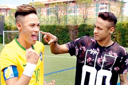 Two good! Barcelona striker Neymar meets his twin