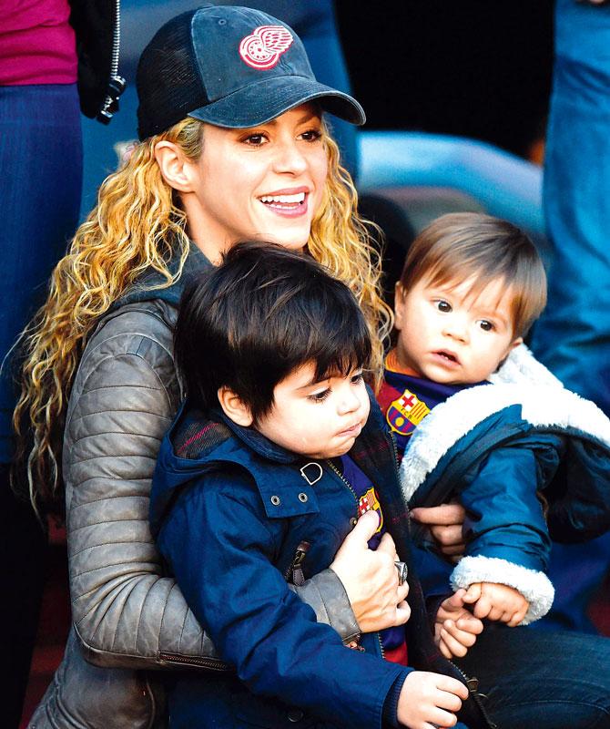 Shakira with her sons Milan (left) and Sasha ahead of the La Liga match between FC Barcelona and Real Sociedad at Camp Nou, Barcelona in November last year. Pic/Getty Images