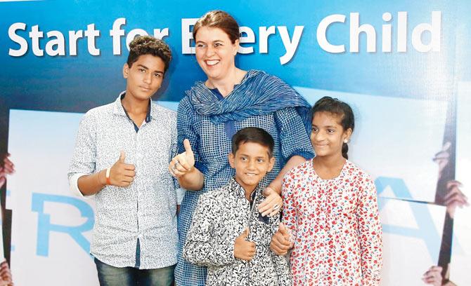 Chief Advocacy and Communication, Unicef India, Caroline d en Dulk (centre), poses with members of the crew of #FairStart campaign
