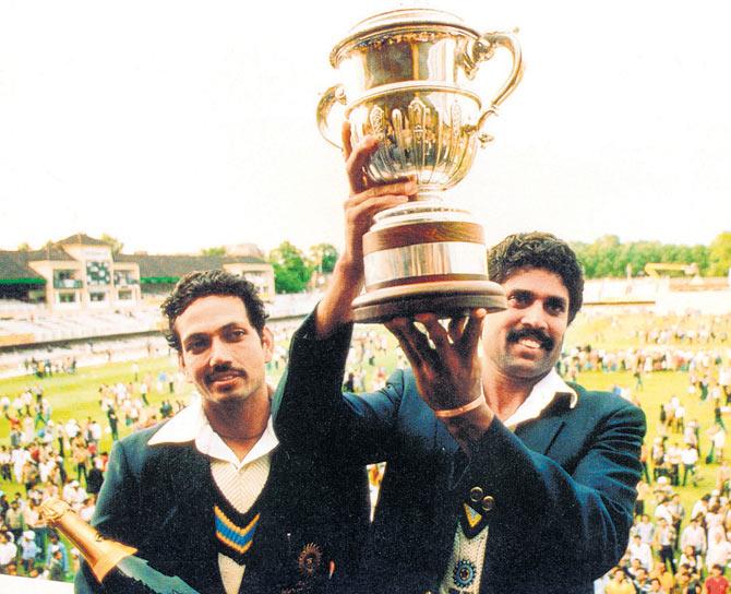 Mohinder Amarnath and Kapil Dev hold aloft the World Cup trophy at Lord’s after their famous triumph in 1983. File Pic