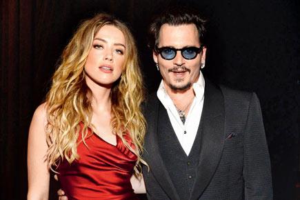 Doug Stanhope claims Amber Heard 'blackmailed' Johnny Depp