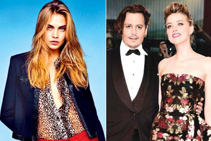 Johnny Depp fears Amber Heard is cheating on him with Cara Delevingne