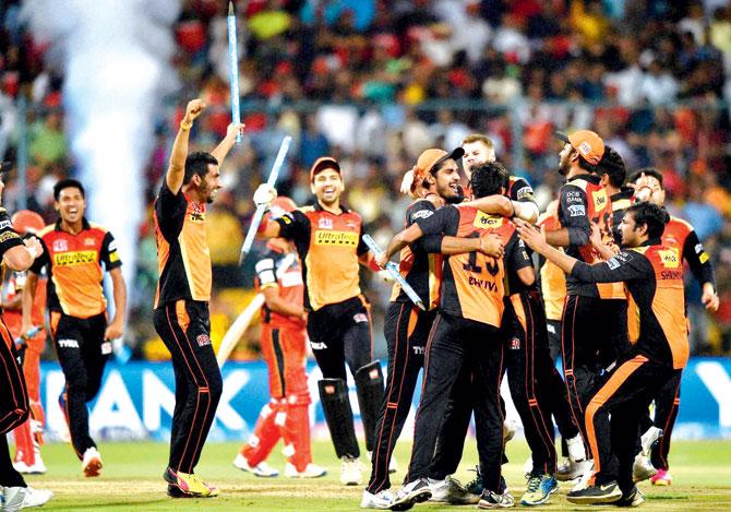 Sunrisers Hyderabad players celebrate their eight-run victory over Royal Challengers Bangalore in the IPL-9 final at the Chinnaswamy Stadium in Bangalore on Sunday. Pic/PTI