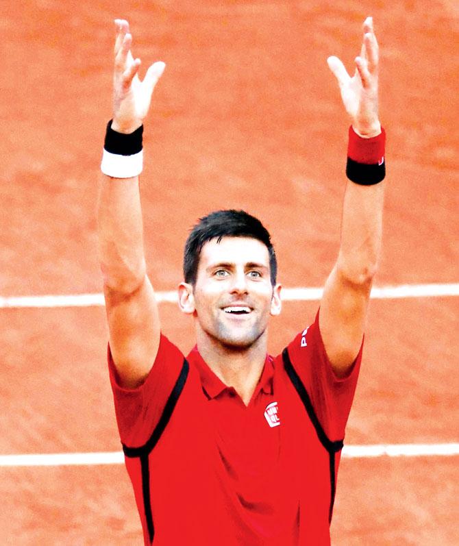 Novak Djokovic celebrates after his third-round win against Britain
