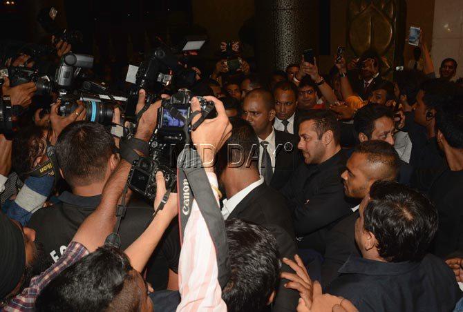Salman Khan surrounded by the paparazzi at the venue of Preity Zinta