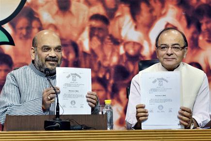 Amit Shah, Arun Jaitley show PM's degrees, demand apology from Arvind Kejriwal