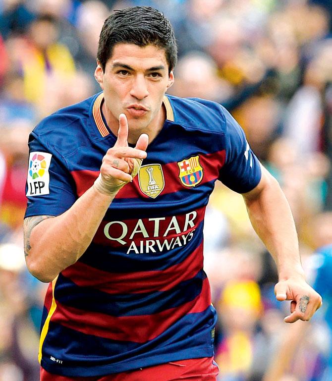 A jubilant Luis Suarez of Barca celebrates after scoring a goal against Espanyol yesterday. Pic/AFP
