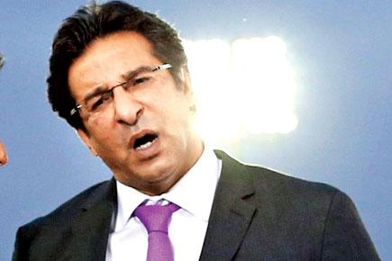 Wasim Akram slams critics over coach issue