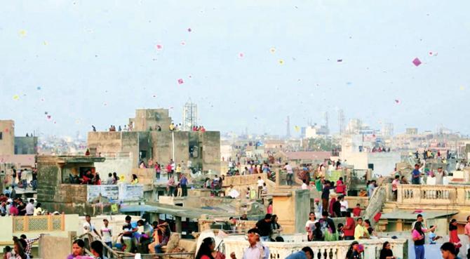Ahmedabad skyline during the kite flying festival; The protagonist, Zaid, is ecstatic at catching a kite
