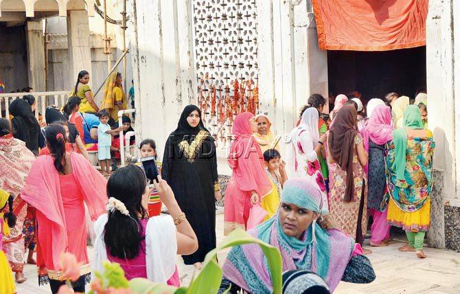 Women make their way into Haji Ali dargah from the special entrance which stops them short of the mazaar of the Sufi saint. Pic/Sayed Sameer Abedi