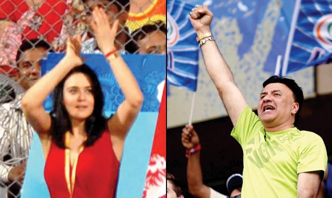 Preity Zinta and (right) Anu Malik in his ‘lucky tee’ at an IPL match