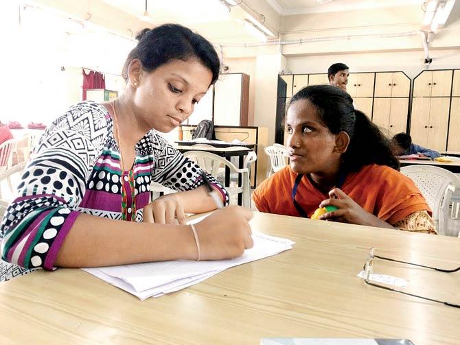 Writer Mrunali Khopkar at a practice session with SYBA student Archana Gosavi