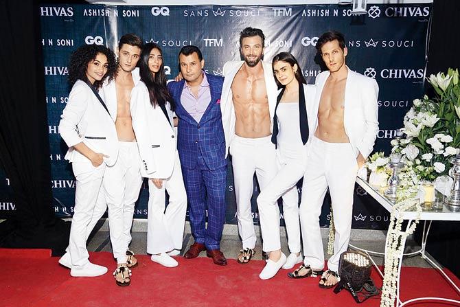 Designer Ashish Soni with beautiful bodies at the launch in the capital last weekend