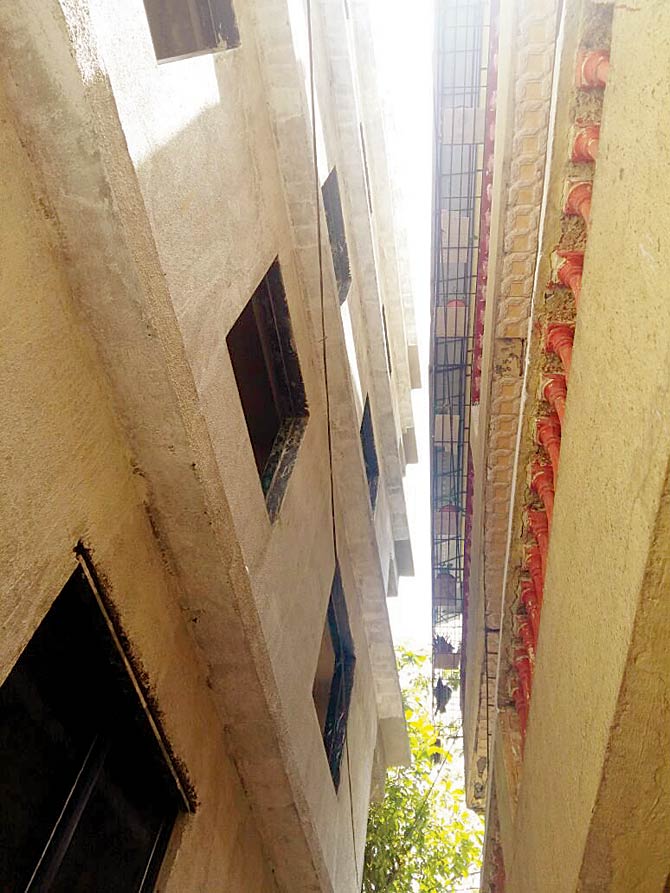 Paritosh died by falling in the gap between these two buildings