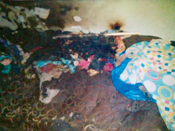 The charred mattress of Lalita Krishna Bombe, who allegedly set it on fire on Wednesday. Pic/Rajesh Gupta