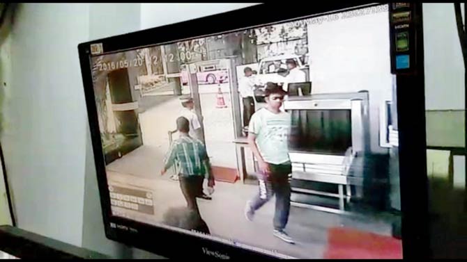 The man was caught on CCTV camera sauntering into the valet parking area. Pics/Rajesh Gupta