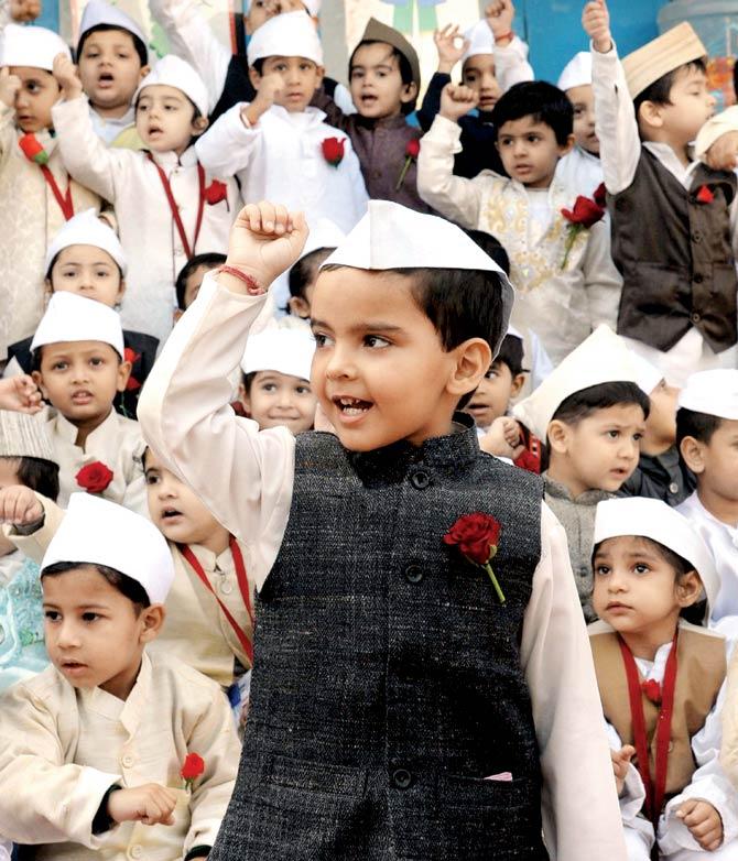Kids dress up as Jawaharlal Nehru, to mark his birthday on November 14, 2014. Pic/AFP