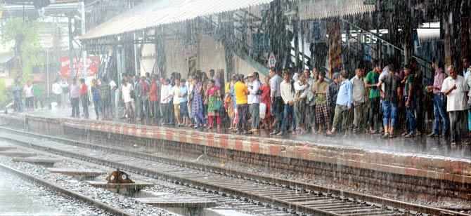 Commuters were stranded at stations after the heavy downpour brought train operations to a standstill on June 19 last year. File pic