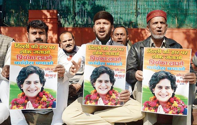 Congress workers hold a demonstration demanding Priyanka replace Rahul Gandhi to ‘save the party’ after the Delhi elections last February. Pic/AFP