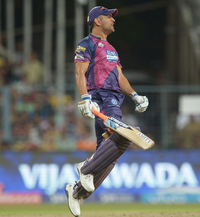 Rising Pune Supergiants captain Mahendra Singh Dhoni reacts as his teammate Irfan Pathan is run out during the match between Kolkata Knight Riders and Rising Pune Supergiants at the Eden Gardens Cricket Stadium in Kolkata. Pic/AFP