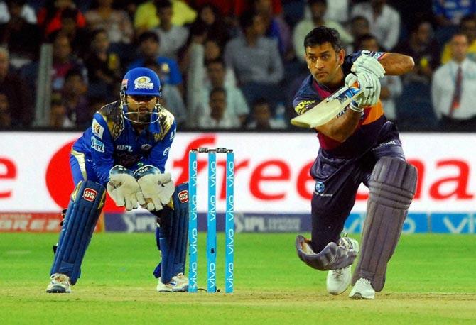 Rising Pune Supergiants player M S Dhoni plays a shot during the IPL T20 match between the Rising Pune Supergiants and the Mumbai Indians at the Maharashtra Cricket Association
