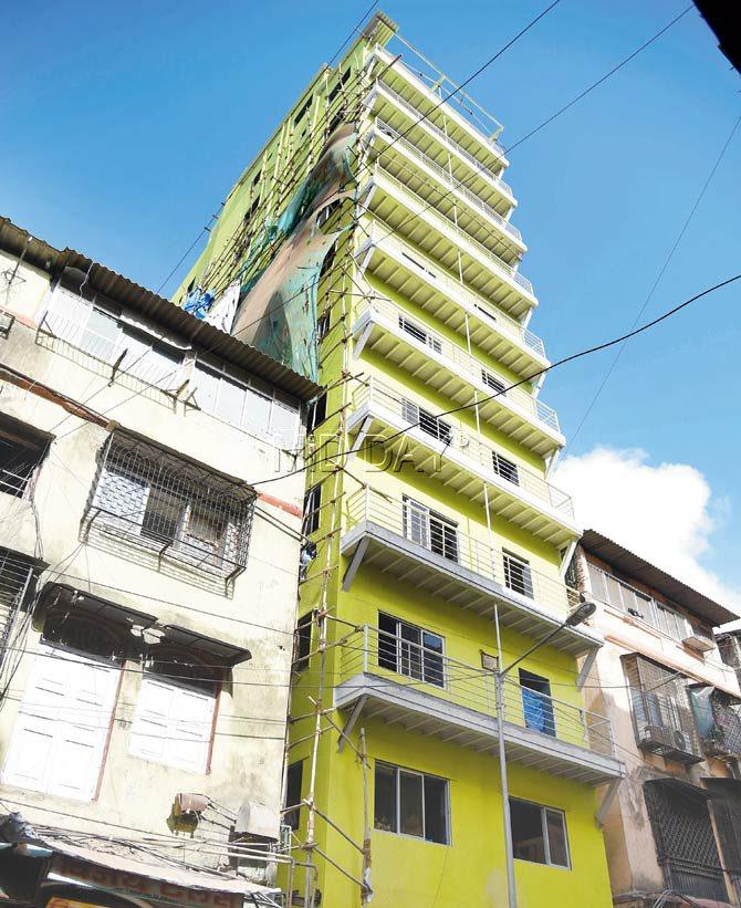 Building no. 11 on Keshavji Naik Road in Dongri, which has today become an 11-storey structure. Pic/Sameer Markande