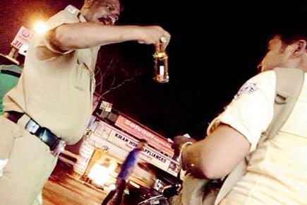 Watch Video: Drunk cop terrorises Malwani for 2 hours