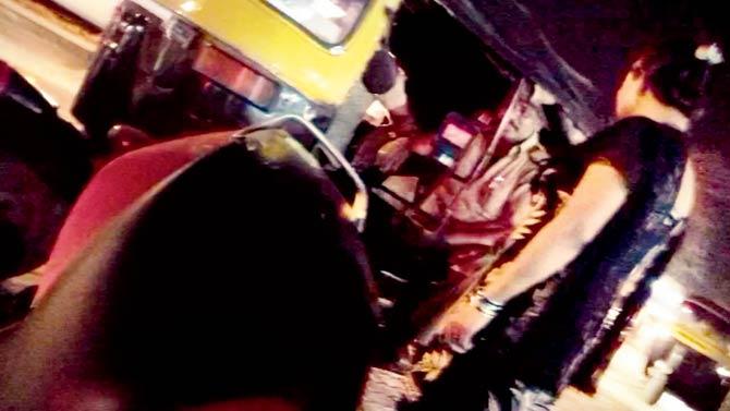 Two hours later, he gets into an autorickshaw and finally leaves