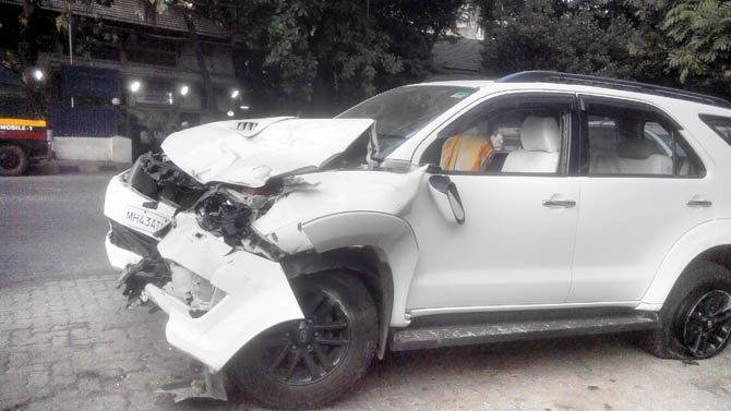 The white Fortuner that hit the toll booth