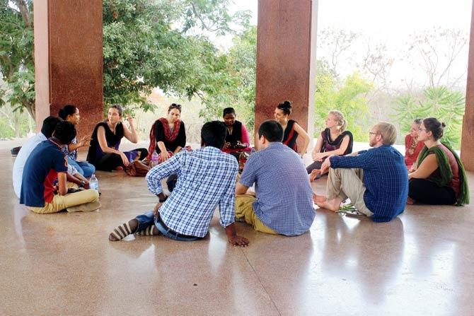 Visitors to the Sanjay Gandhi National Park take a break at Gandhi Tekdi on Wednesday. Pic/Prabhanjan Dhanu