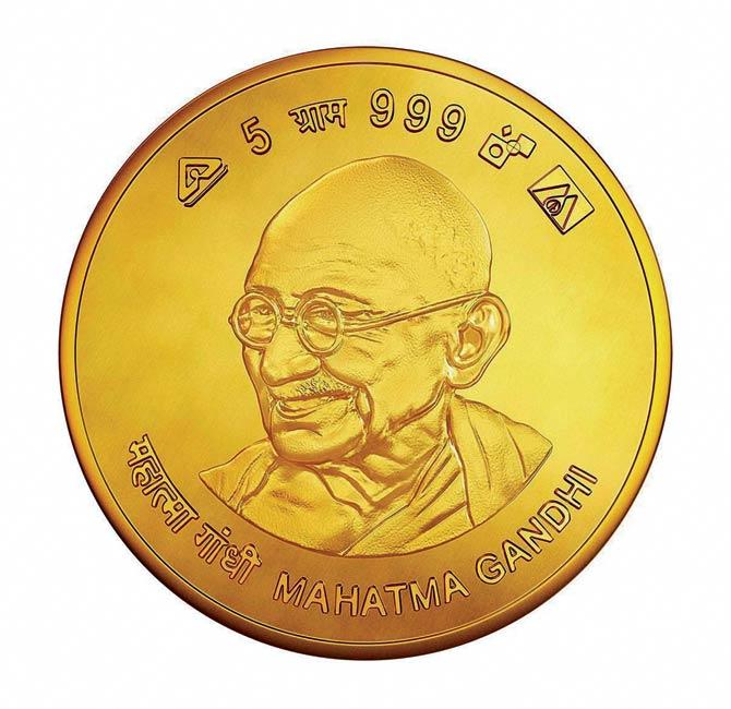 The government launched gold coins bearing Mahatma Gandhi’s image, on the occasion of Akshaya Tritiya. Pic/PTI