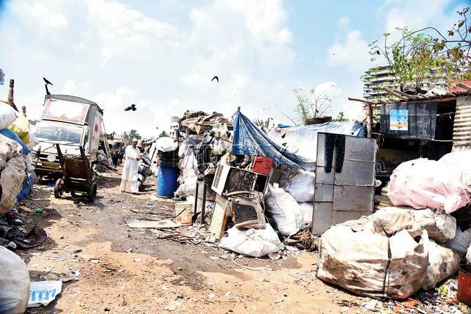 Locals from the Khar Danda slums allege that scrap shops have become a haven for mosquitoes and anti-social elements. Pic/Sameer Markande