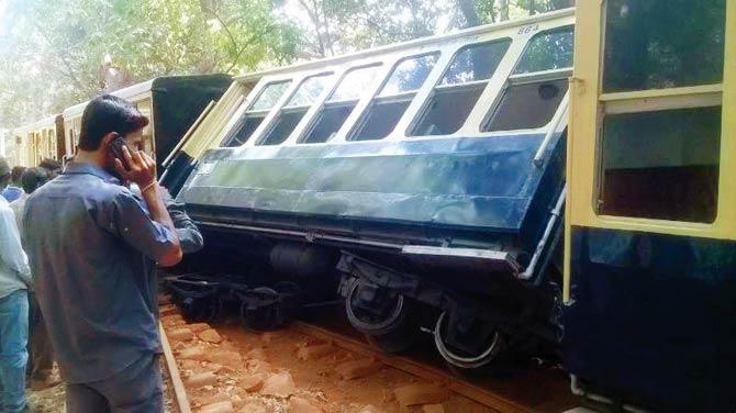 The derailed coach of the toy train