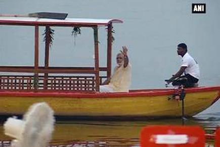PM Modi enjoys e-boat ride in Varanasi