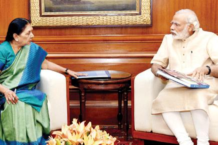 Anandiben meets Narendra Modi, rival Nitin Patel meets Amit Shah