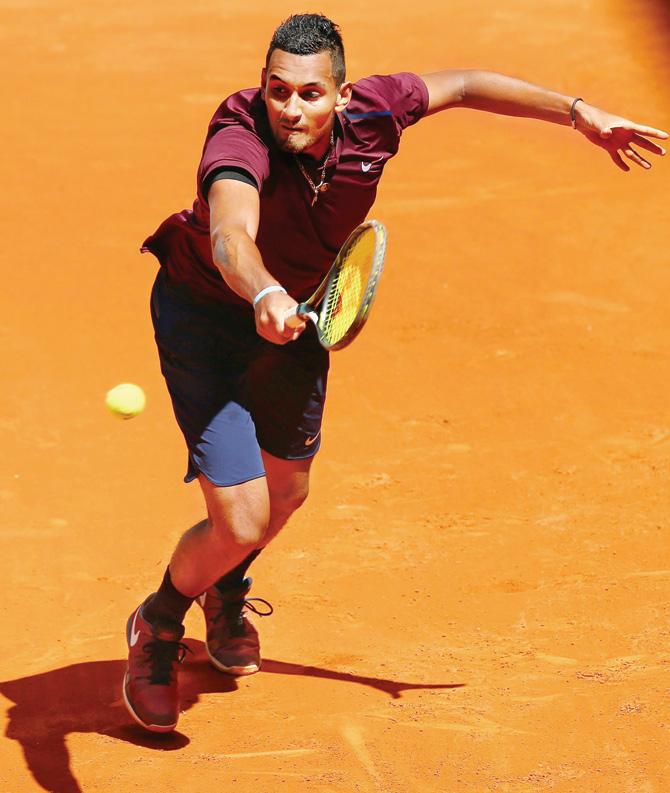 Australia’s Nick Kyrgios plays a backhand during his straight sets victory against Switzerland’s Stanislas Wawrinka 