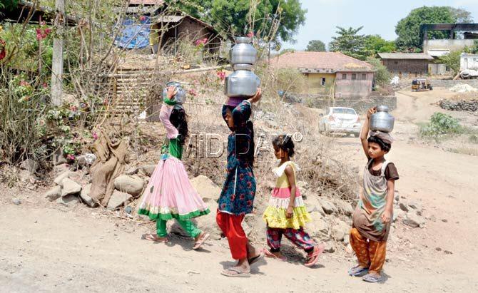 Even children are forced to trek 2-3 km each day for water. Pics/Datta Kumbhar