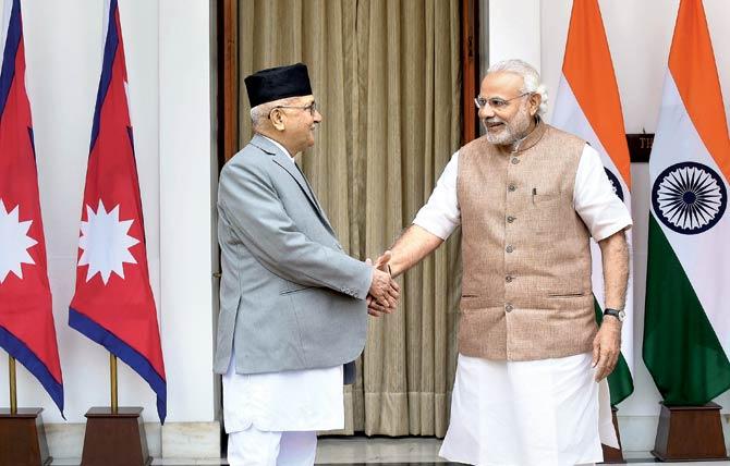 PM Modi and Nepalese PM KP Oli meet in New Delhi in February. Though various agreements were arrived at, both sides remained suspicious of each other. Pic/AFP