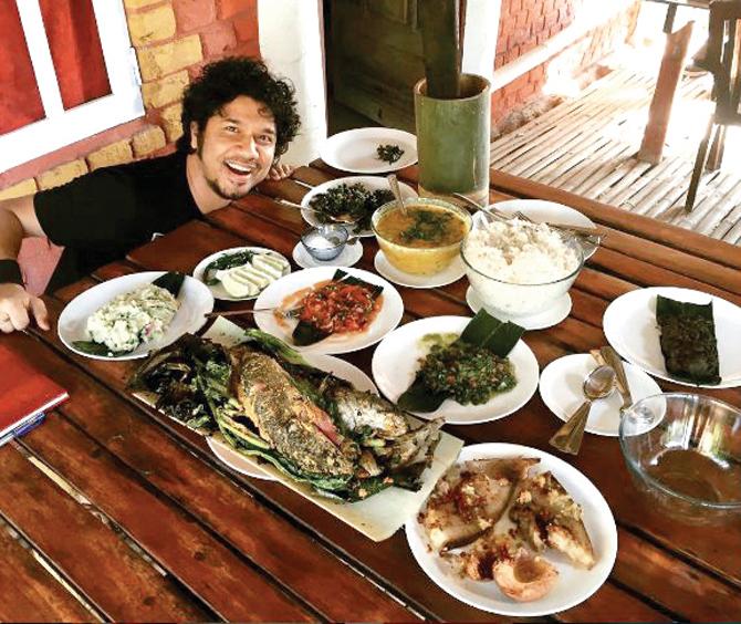 Enjoying a meal at Deka Saang on Majuli island, the largest river island in the world