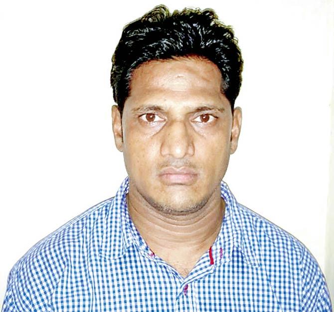 The accused peon Rajesh Yashwant Jadhav