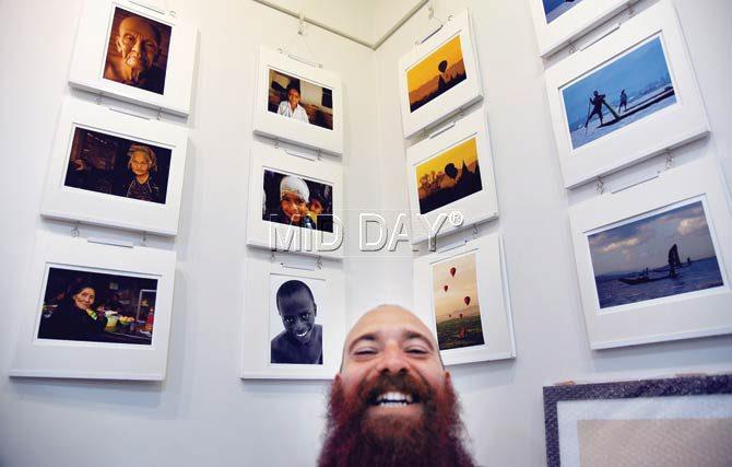 Stefano Tomassetti flashes a broad smile at his exhibition. Pic/Sameer Markande