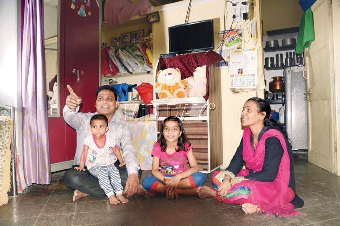 Sunil Yadav, wife Sanjana and their children at home in Chembur. Pics/Pradeep Dhivar