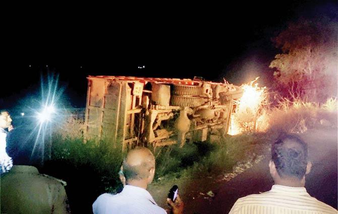 The gravel-laden tipper after the mishap that occurred on the intervening night of Saturday-Sunday. Pic/PTI
