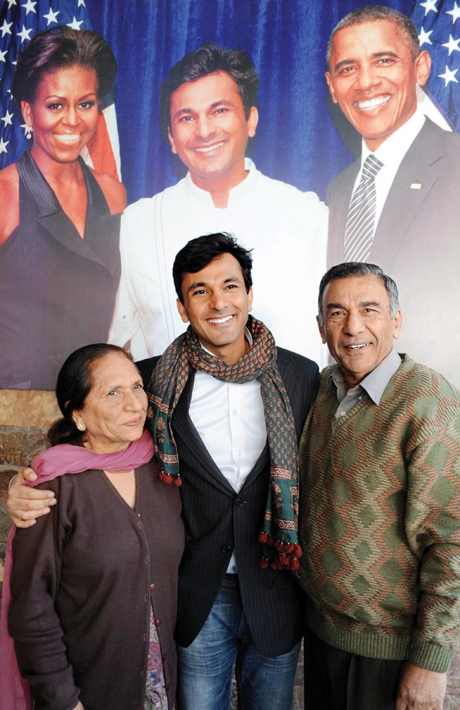 Vikas Khanna with his mother Bindu and father Davinder in Amritsar  in 2012. Pic/AFP
