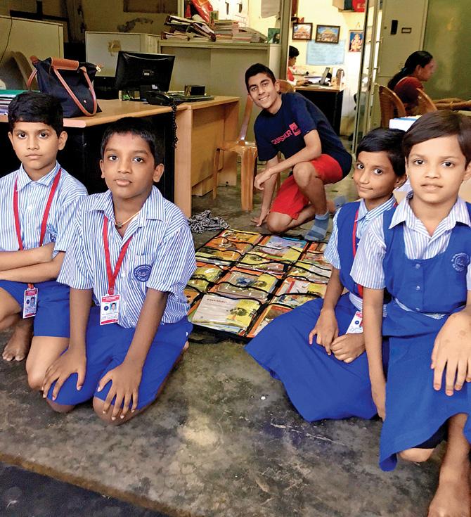 Viraaj Vig (in centre) with students at Dharavi School